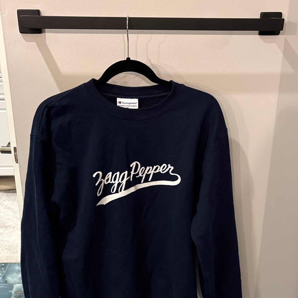 Warby Parker “Zagg Pepper” sweatshirt.